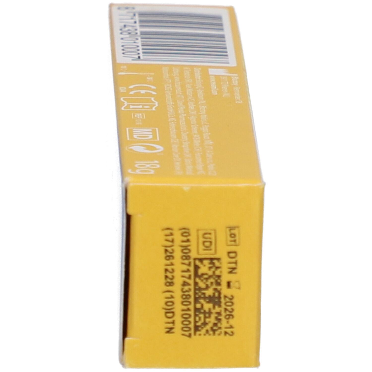 Boîte, vue latérale. Inscription : Revamil, code-barres, UDI, LOT, DTN, MD.