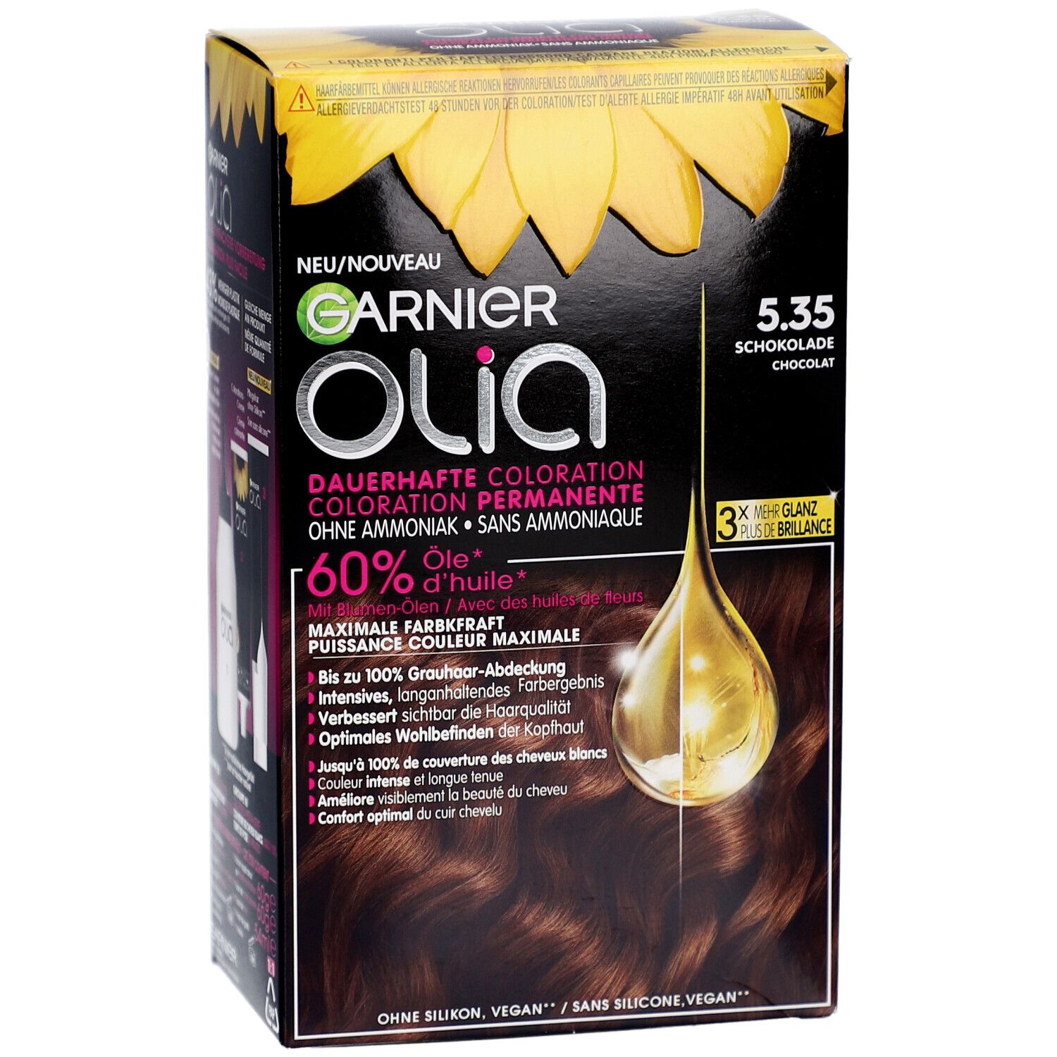 Garnier Olia permanente haarkleur 5.35 chocoladebruin. Doos met productafbeelding en tekst. Bevat 60% olie. Zonder siliconen, vegan.
