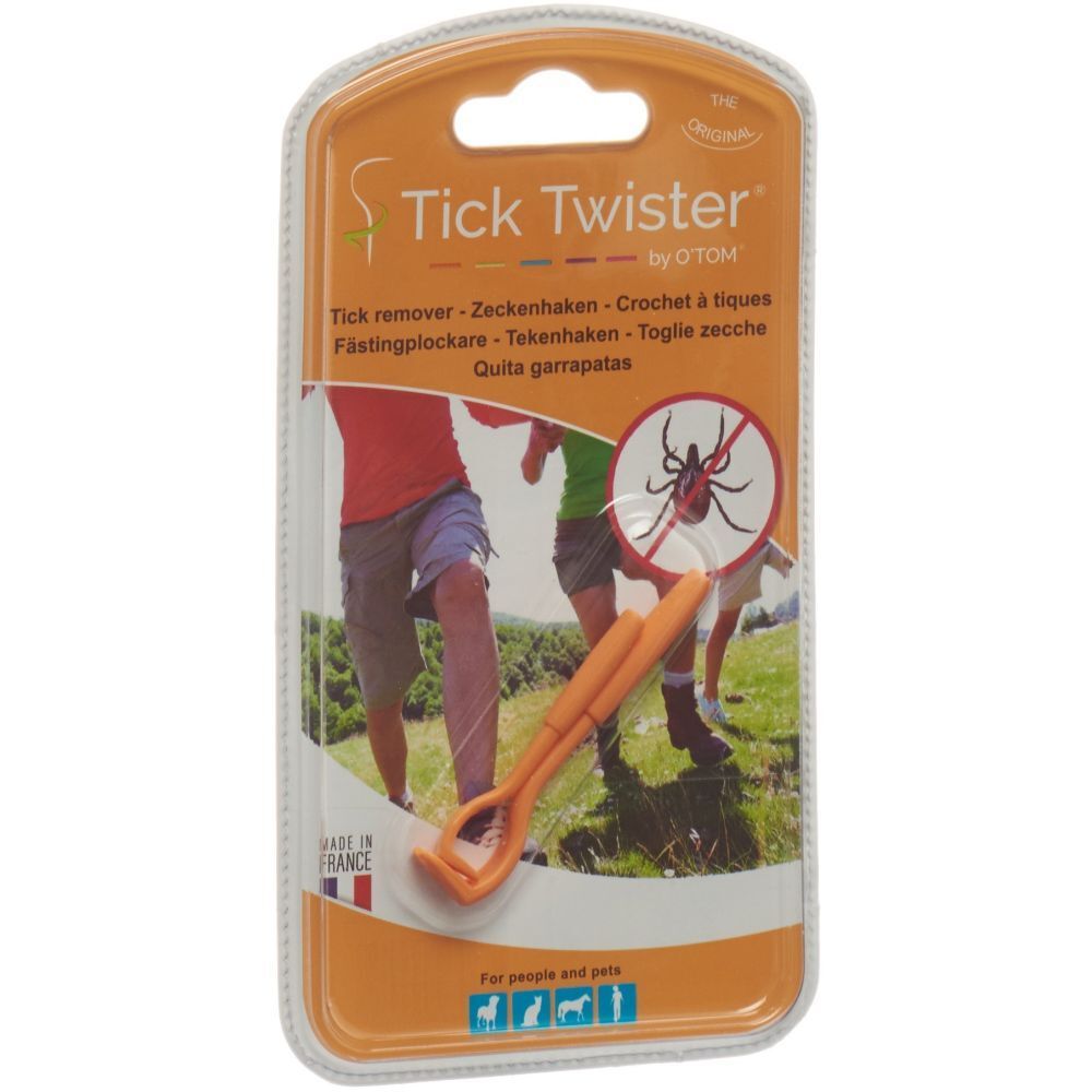 Crochet à tiques orange dans un emballage blister. Nom du produit: Tick Twister by O'TOM. Emballage avec illustration de tique.