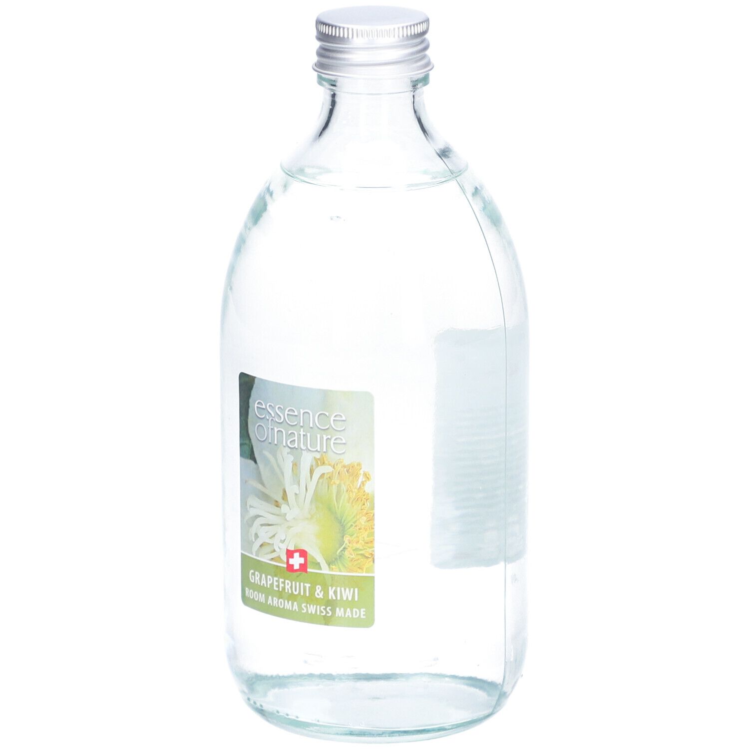 Flacon en verre avec bouchon argenté. Étiquette avec nom du produit et illustration. "Grapefruit & Kiwi" et "Room Aroma Swiss Made".
