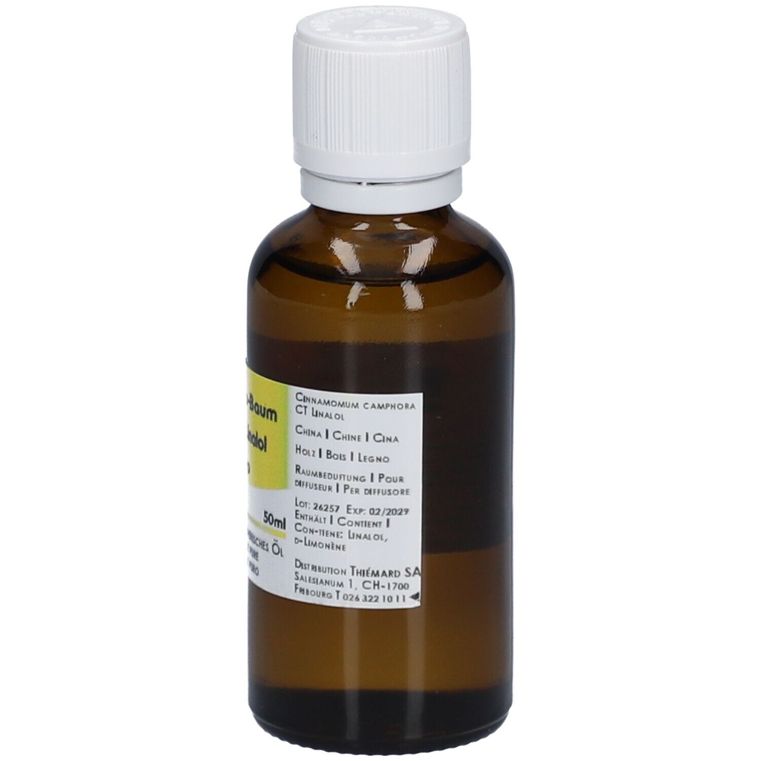 Flacon en verre brun avec bouchon blanc. Étiquette avec nom du produit et informations. 50ml.