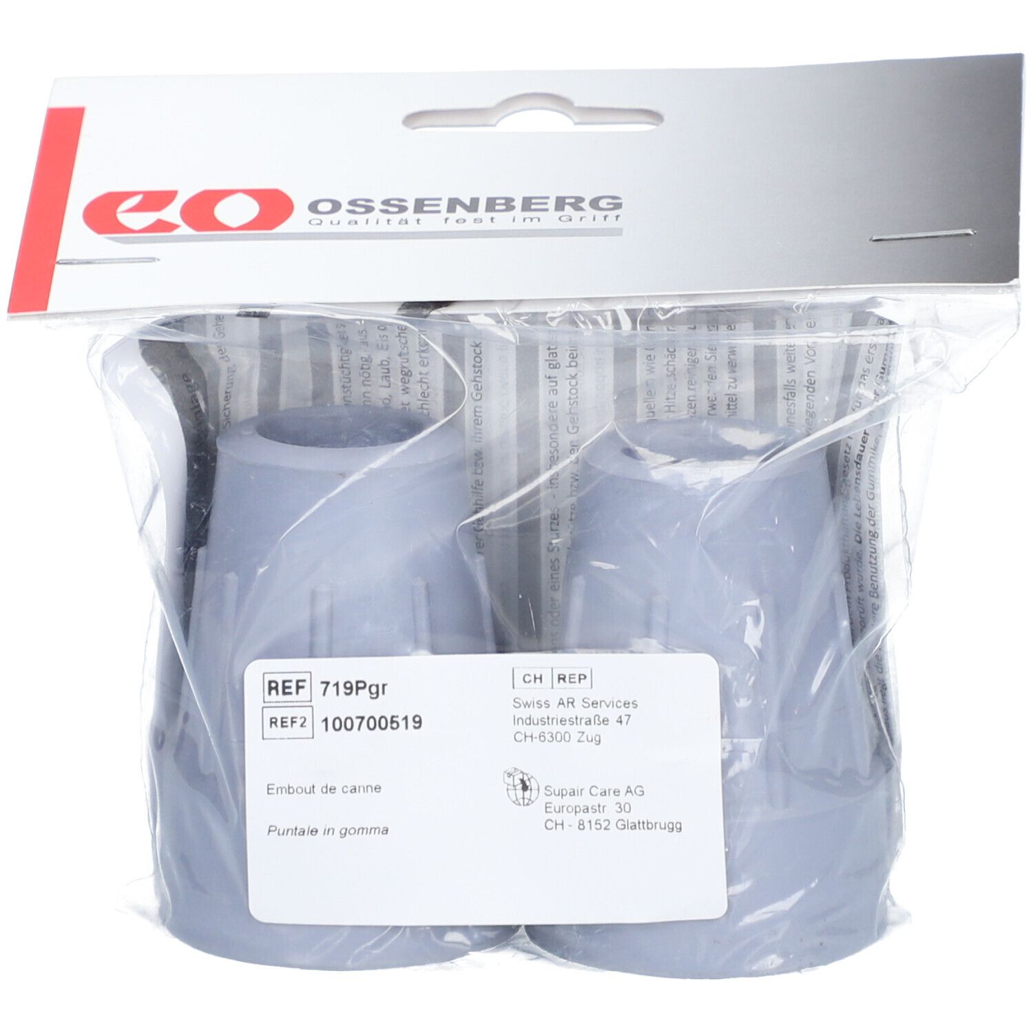 Deux embouts de canne gris dans un emballage plastique. Logo et texte en haut. Étiquette avec référence et description.