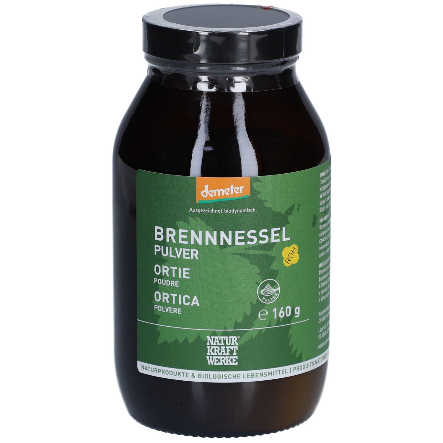 Bruine glazen fles met zwarte dop. Etiket met productnaam, Demeter-logo en 160g. NATURKRAFTWERKE Ortie Poudre Demeter.