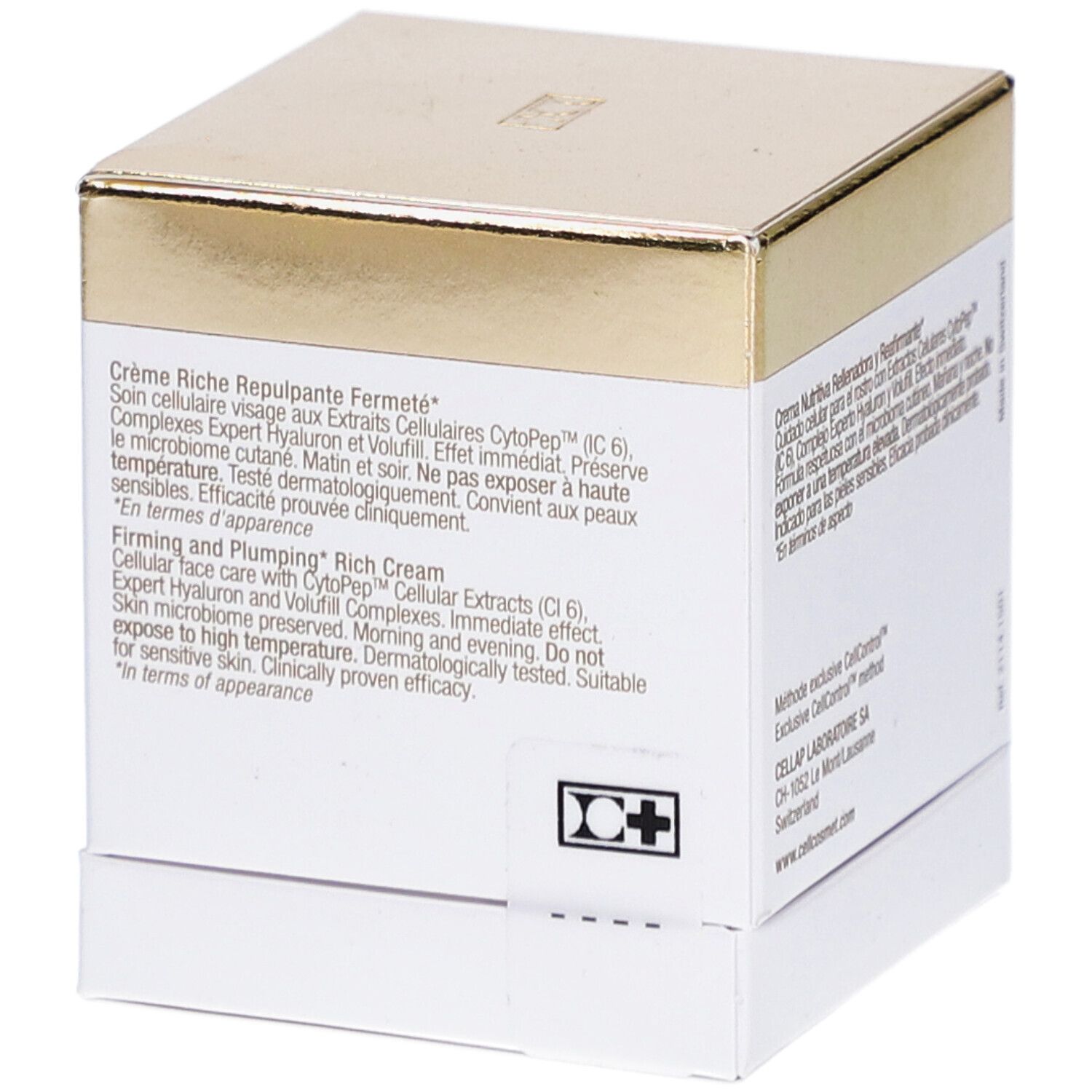 Witte doos met gouden deksel. Tekst: Crème Riche Repulpante Fermeté. Firming and Plumping Rich Cream.
