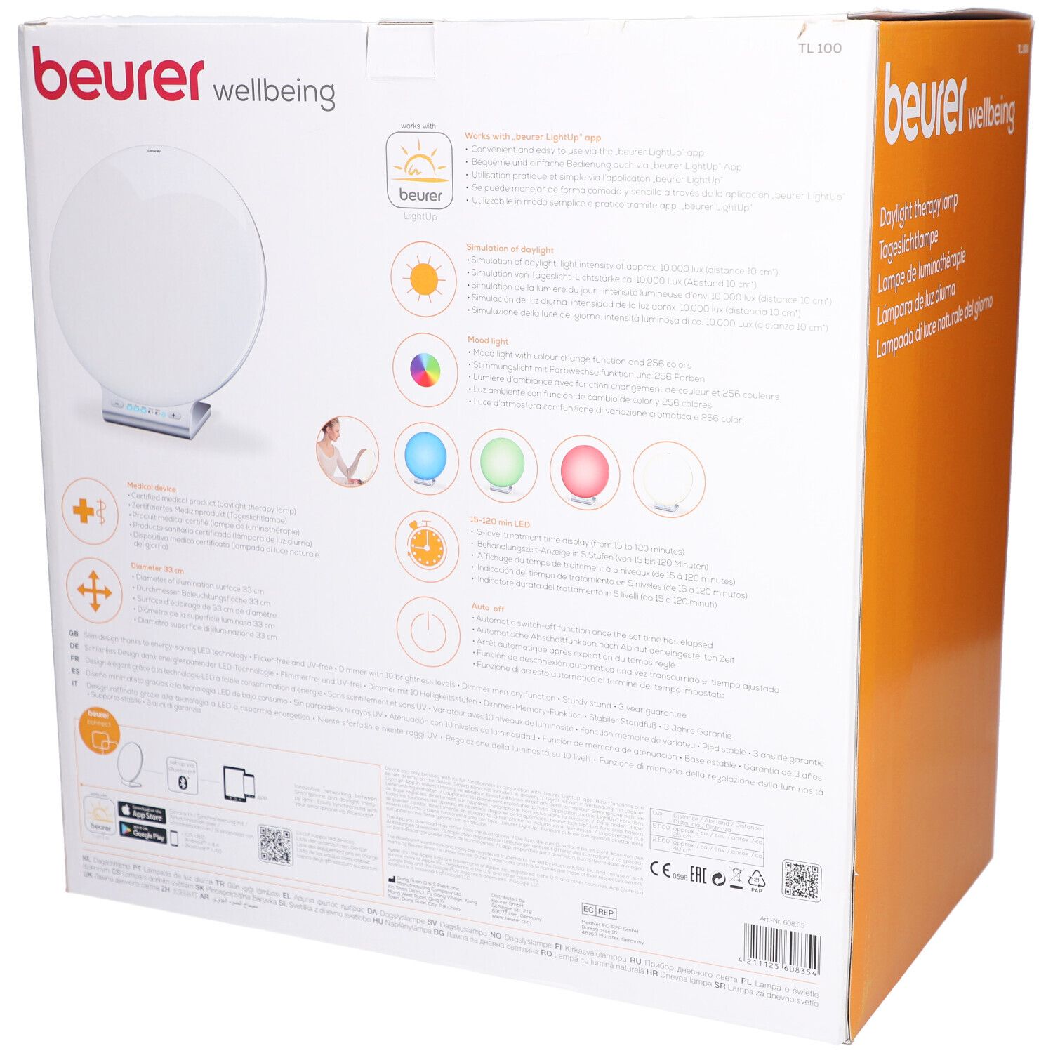 Beurer TL 100 verpakking. Achterkant met productinformatie. Illustraties van functies en certificeringen.