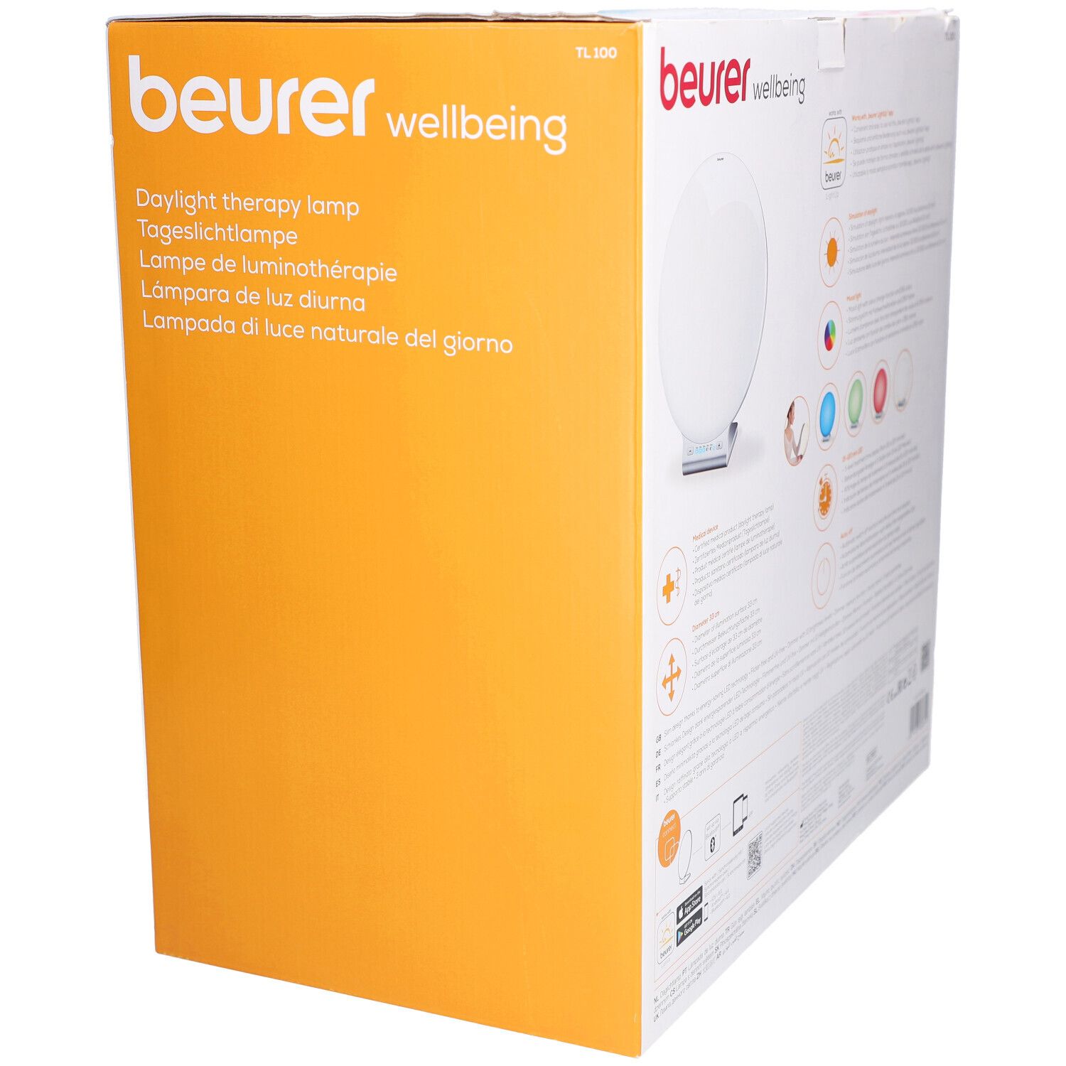 Beurer TL 100 verpakking. Opdruk: Daglichttherapielamp & sfeerverlichting. Productafbeelding. Oranje achtergrond.