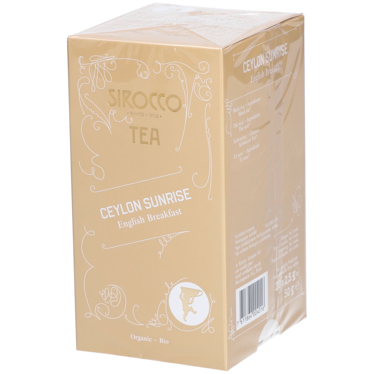 Verpakking van Sirocco thee. Opschrift: Ceylon Sunrise English Breakfast. Gouden doos met witte tekst en logo.