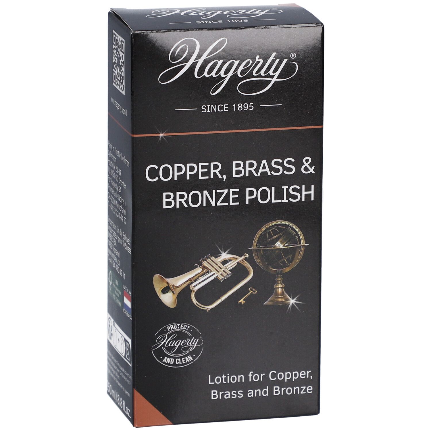 Zwarte Hagerty-verpakking. Tekst: Copper, Brass & Bronze Polish. Afbeelding van trompet en globe.