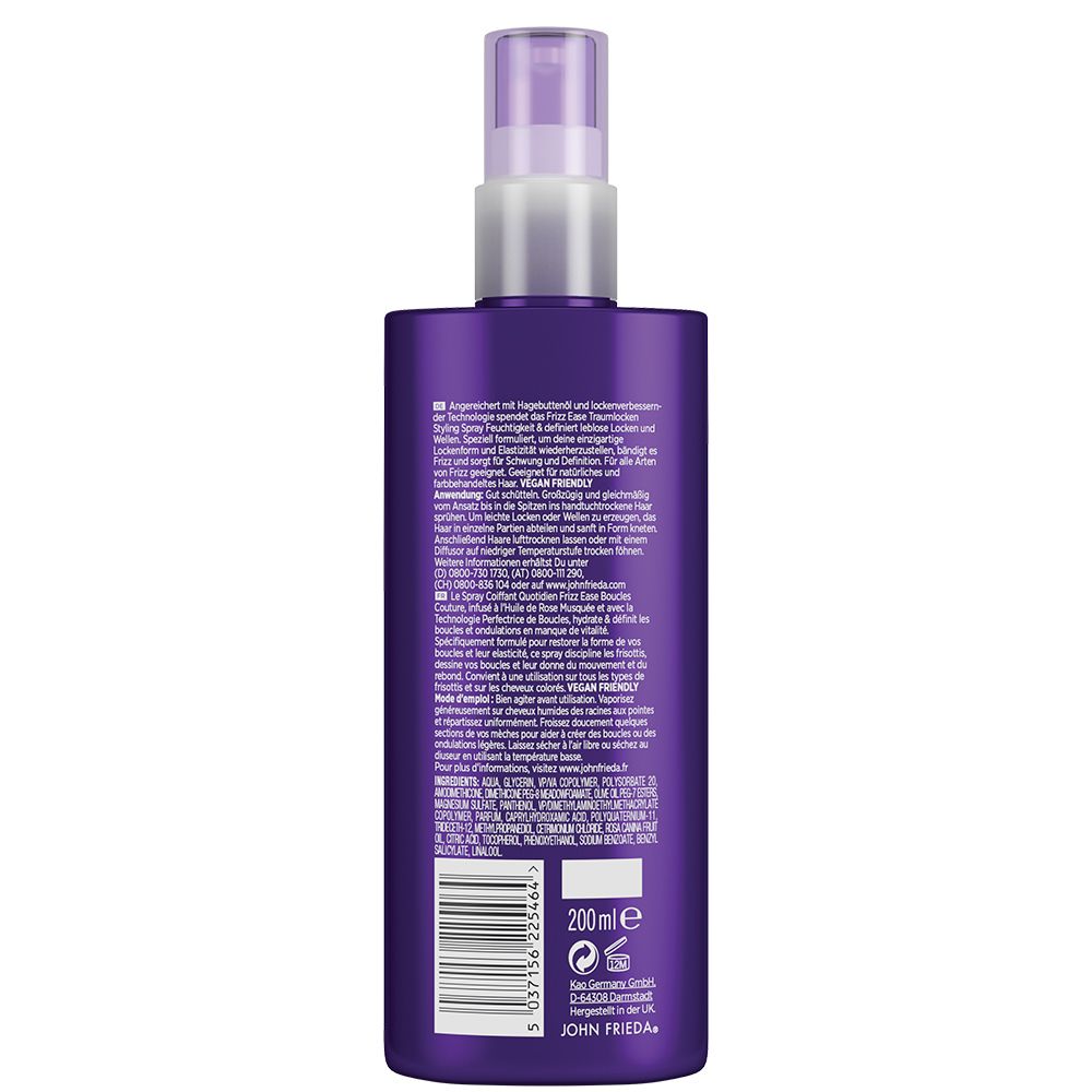 Achterkant van de JOHN FRIEDA Frizz ease Traumlocken Styling Spray fles. Tekst, ingrediënten, 200ml, Vegan Friendly. Barcode.