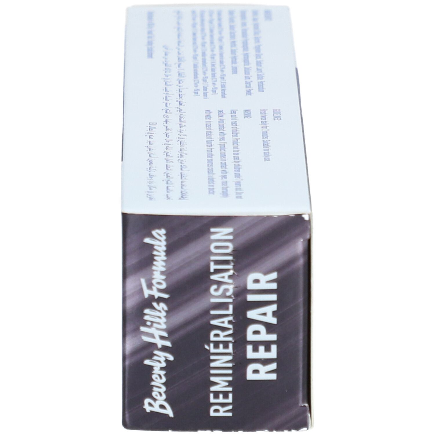 Vue latérale de la boîte. Fond noir, texte blanc. Inscription: Beverly Hills Formula, REMINERALISATION REPAIR.