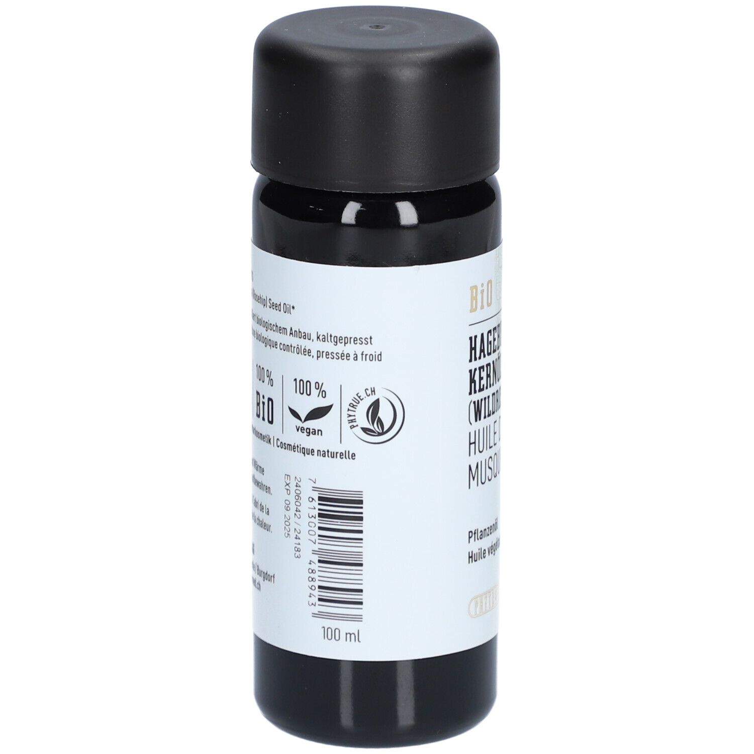 Achterkant van de biologische rozenbottelpitolie fles met zegels en barcode.