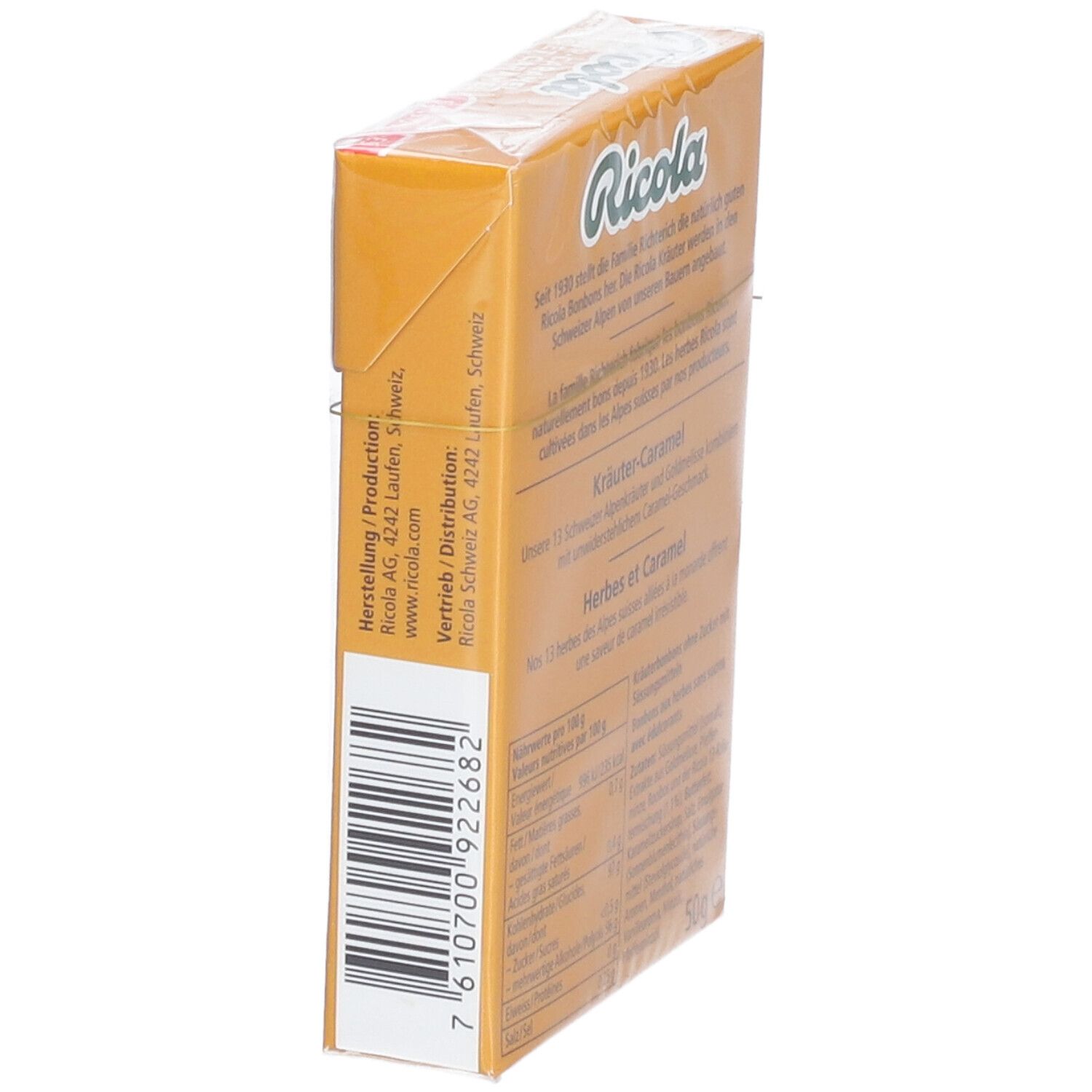 Vue latérale de l'emballage des bonbons Ricola aux herbes et caramel. Code-barres et informations du fabricant.