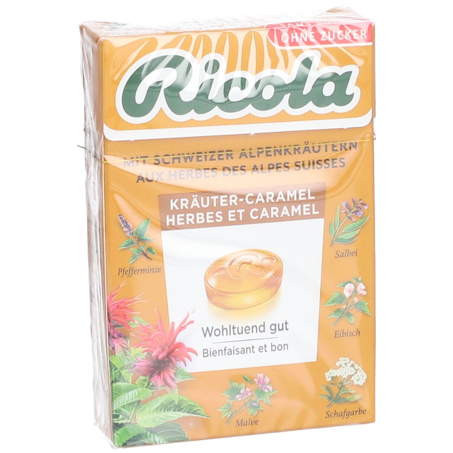Emballage de bonbons Ricola aux herbes et caramel, en biais. Face avant avec nom du produit et herbes.