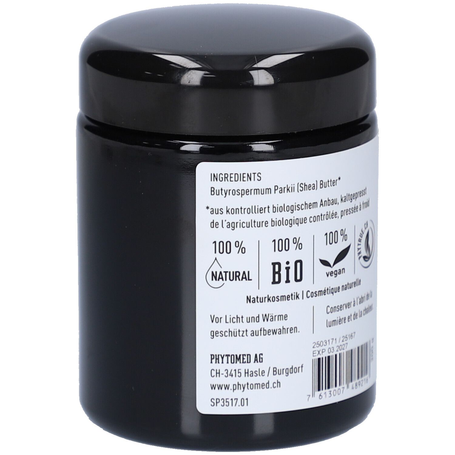 Pot noir avec étiquette. Texte: Ingrédients, 100% naturel, vegan. Adresse du fabricant: Phytomed AG.