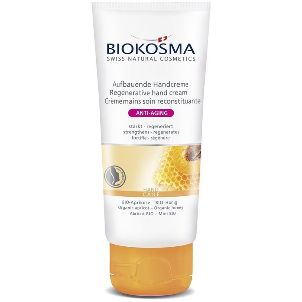 Tube de crème pour les mains BIOKOSMA. Blanche, bouchon jaune. Texte : Crème mains, Anti-âge, BIO-Abricot, BIO-Miel.
