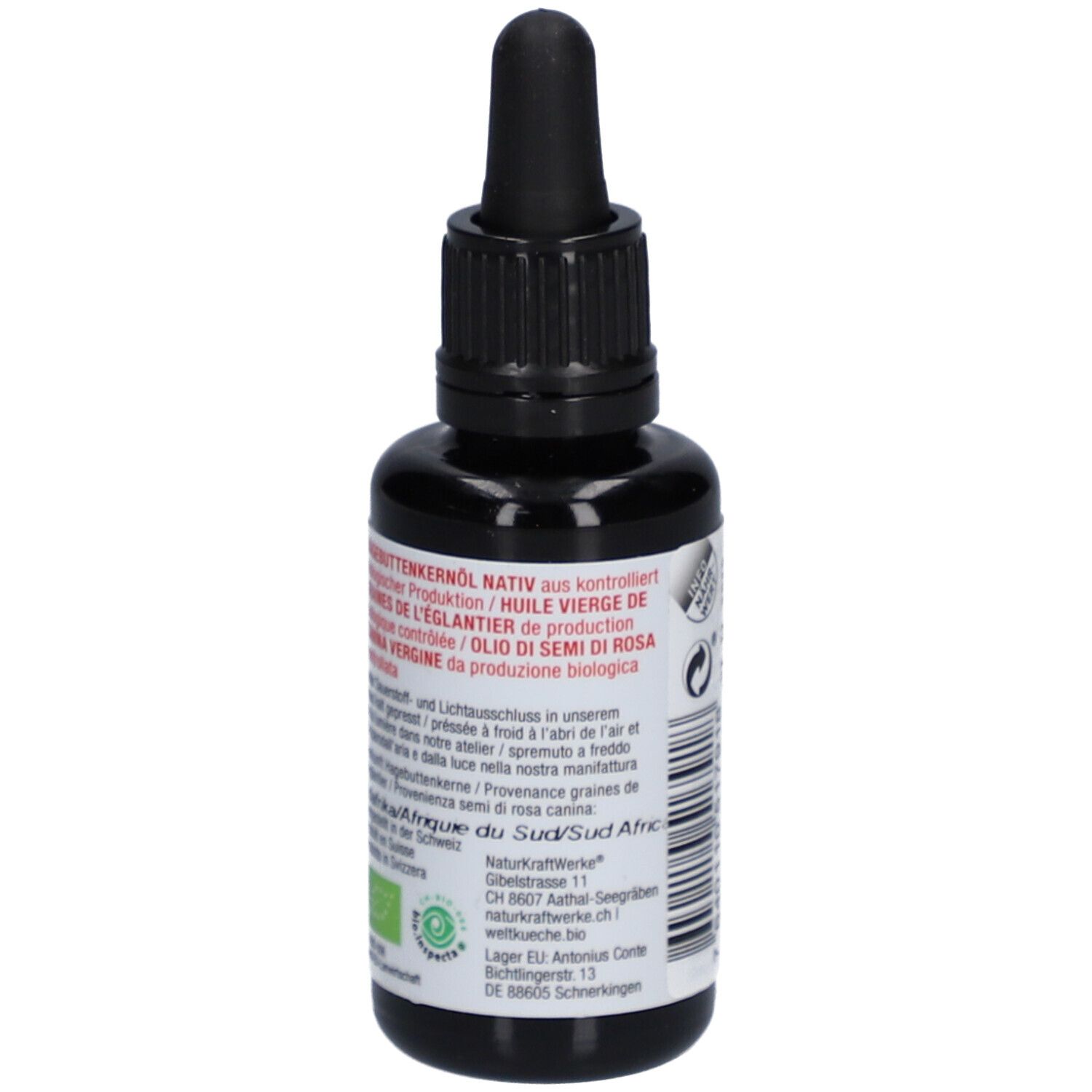 Vue latérale de la bouteille d'huile de pépins de cynorrhodon bio NATURKRAFTWERKE avec sceau bio et indications d'origine.