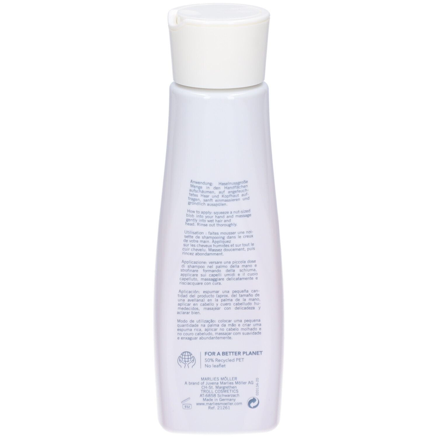 Achterkant van de shampoo fles. Tekst en logo's zichtbaar. Voor een betere planeet.