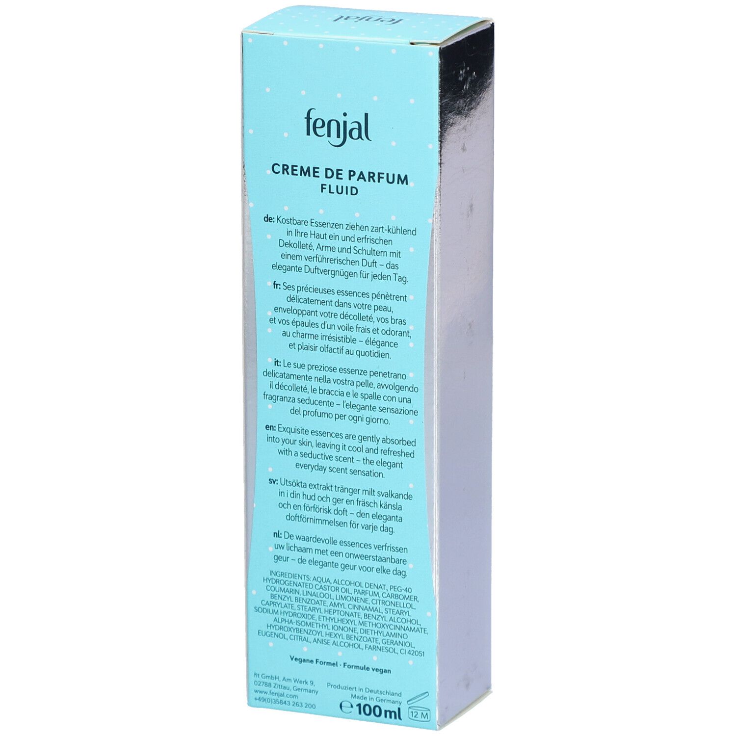 Turquoise en witte doos. Tekst: Creme de Parfum Fluid Classic. Tekst in het Duits, Engels, Frans. Onder: 100ml.