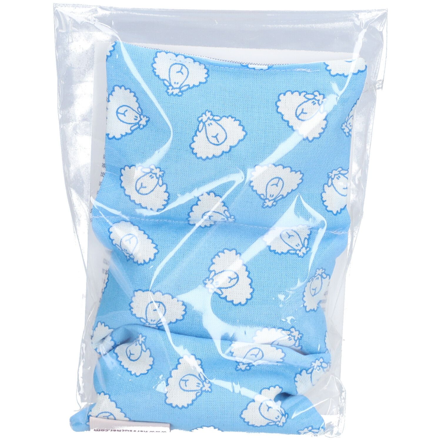 Blauw kussen met schapenpatroon in transparante verpakking.