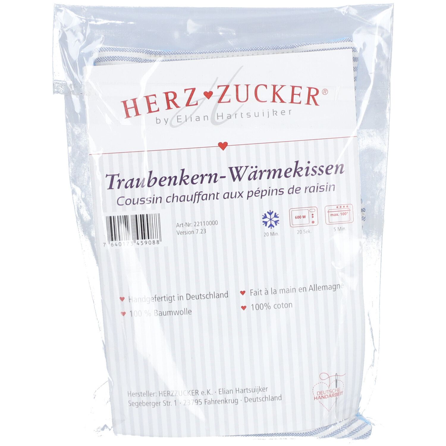 Verpakking met HERZ ZUCKER warmtekussen. Tekst: Druivenpit warmtekussen, 100% katoen.