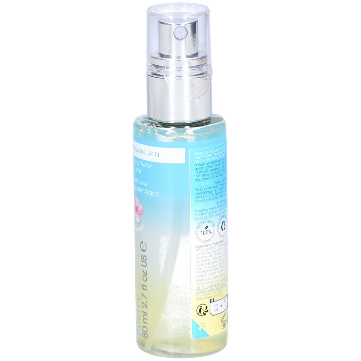 Achterkant van de fles. Etiket met productinformatie. Opschrift: ST. TROPEZ. Fles met verstuiver.