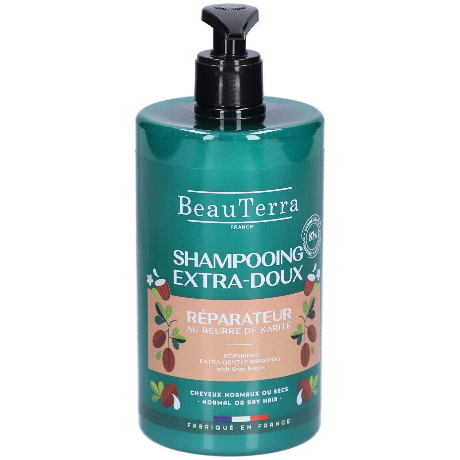 Groene shampoo fles met zwarte pomp. Opschrift: BeauTerra, Shampooing Extra-Doux, Réparateur au beurre de Karité. Voor normaal of droog haar.