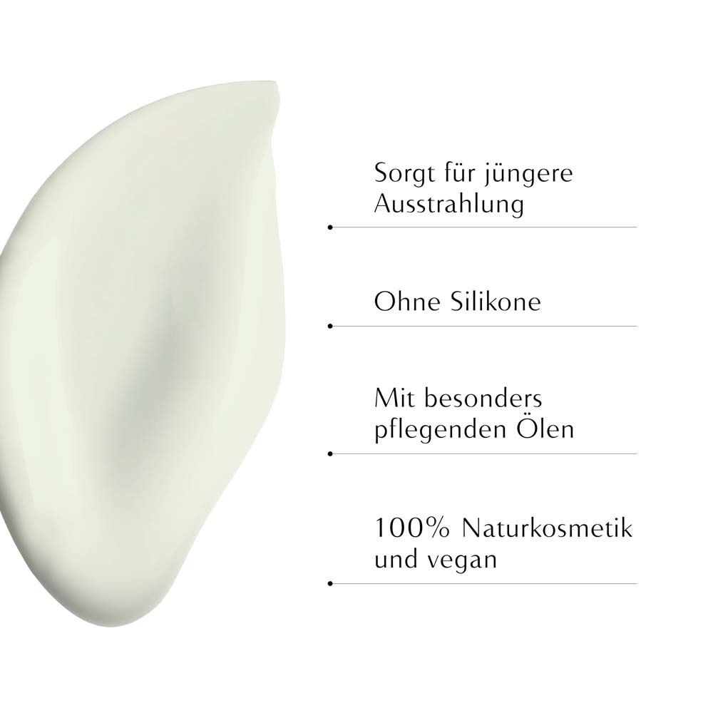 Tache blanche avec texte: Donne un éclat plus jeune, sans silicones, avec huiles nourrissantes, 100% cosmétiques naturels et végétaliens.