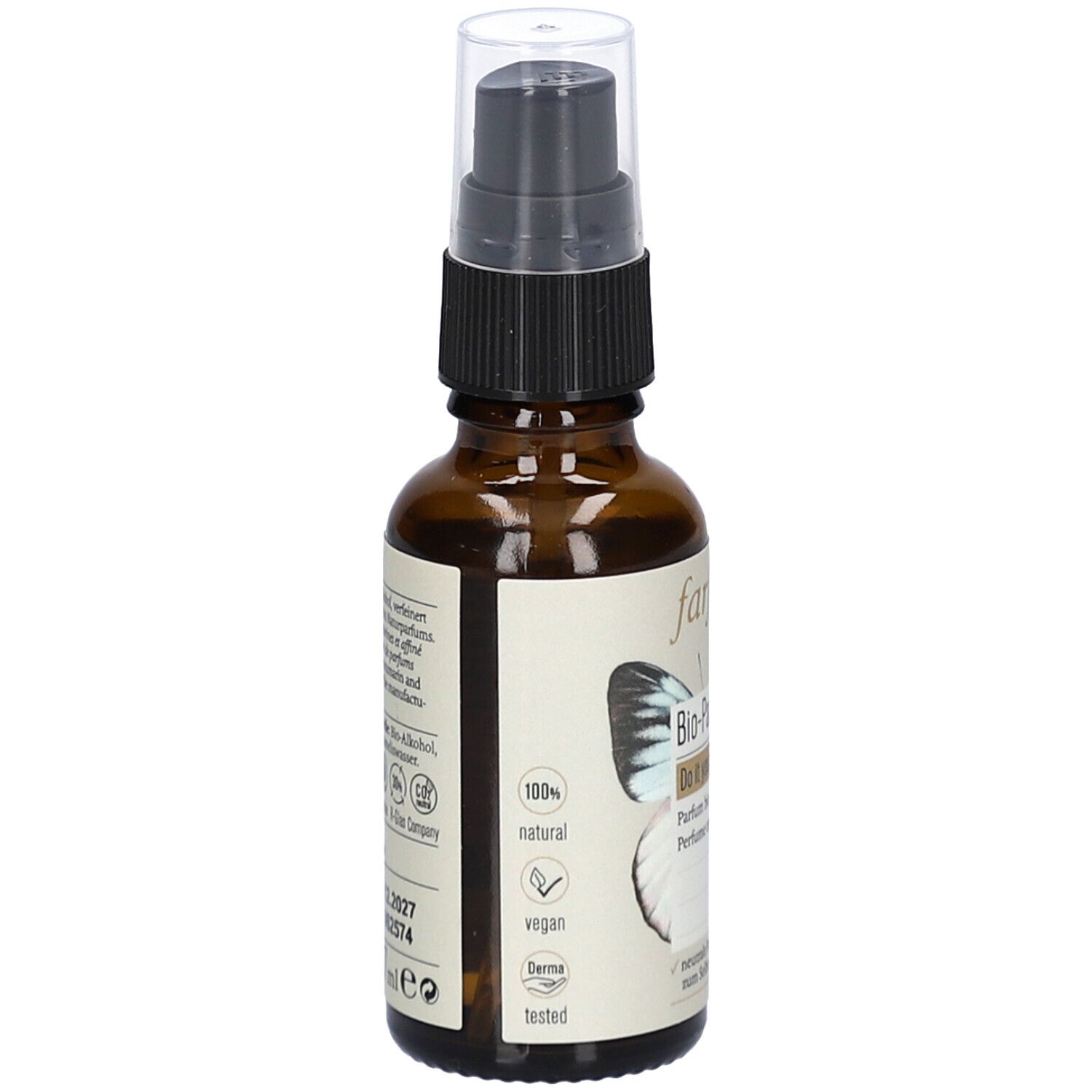 Bruine glazen fles met verstuiver. Etiket met logo, tekst en informatie over ingrediënten en certificeringen.