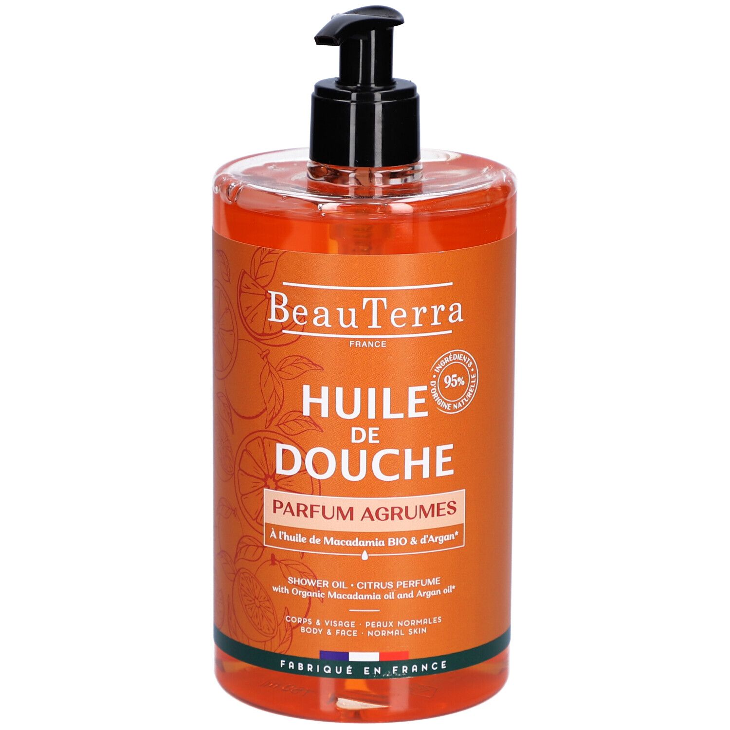Flacon de Beauterra Huile de Douche Parfum Agrumes. Huile orange avec pompe noire. Inscription: Huile de Douche, Parfum Agrumes.