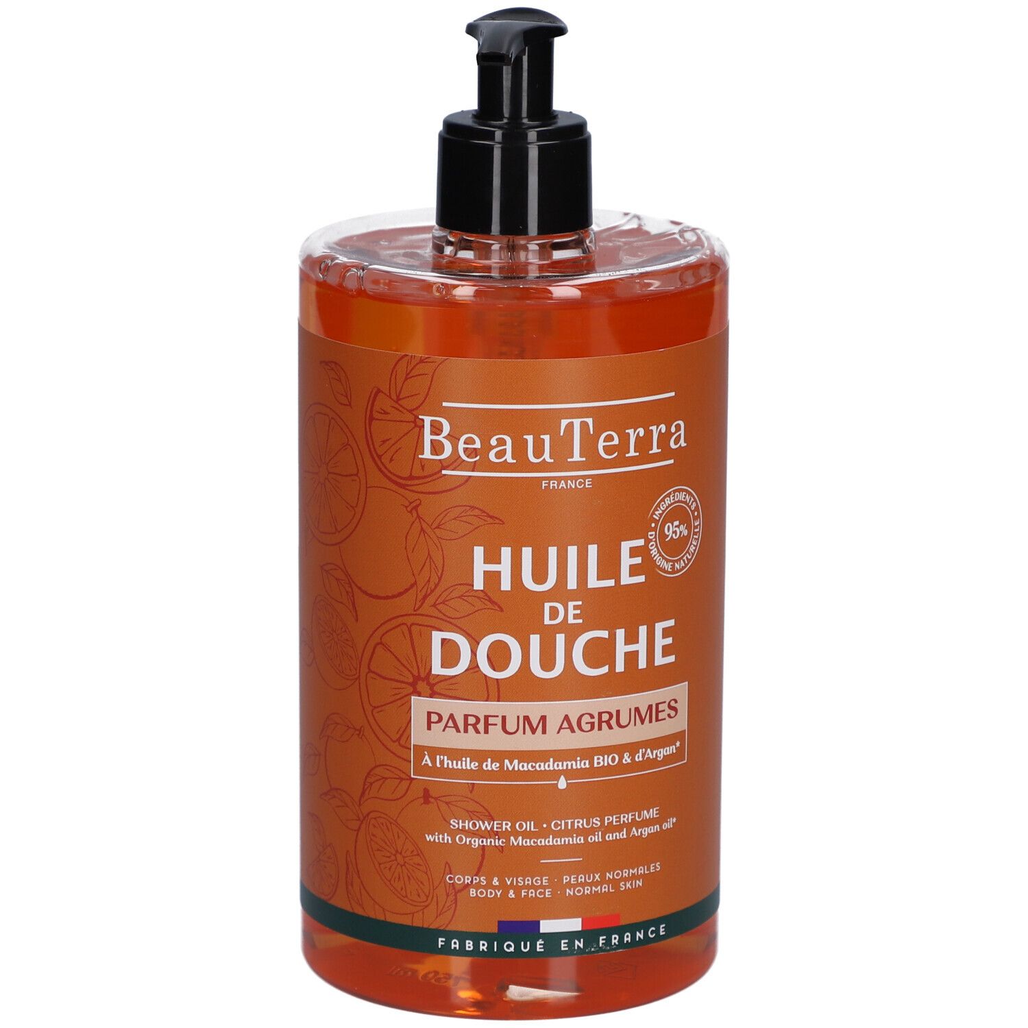 Flacon Beauterra Huile de Douche Parfum Agrumes. Huile orange avec pompe noire. Inscription: Huile de Douche, Parfum Agrumes.