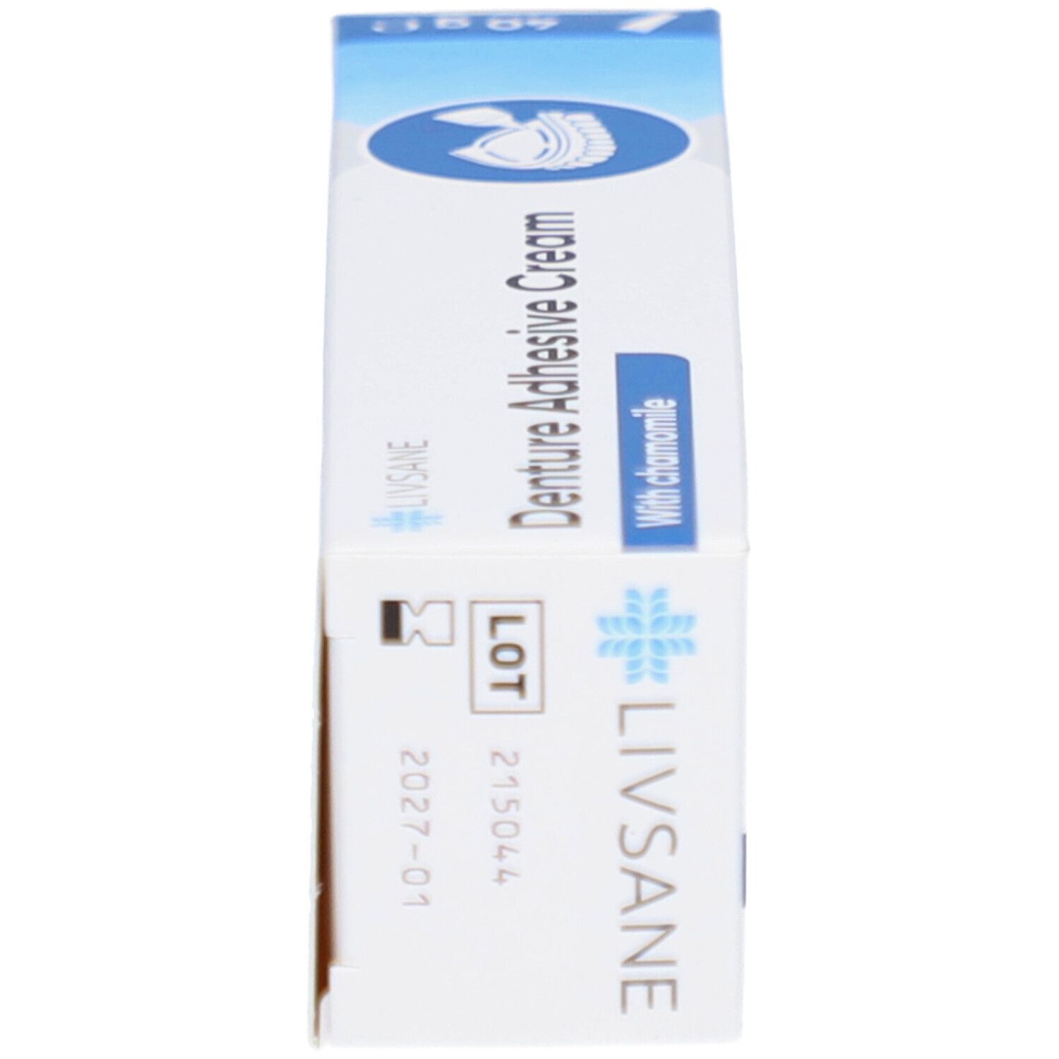 Doosje met tandhechtcrème, zijaanzicht. Opschrift: Livsane, Denture Adhesive Cream, With chamomile. Lotnummer en vervaldatum.