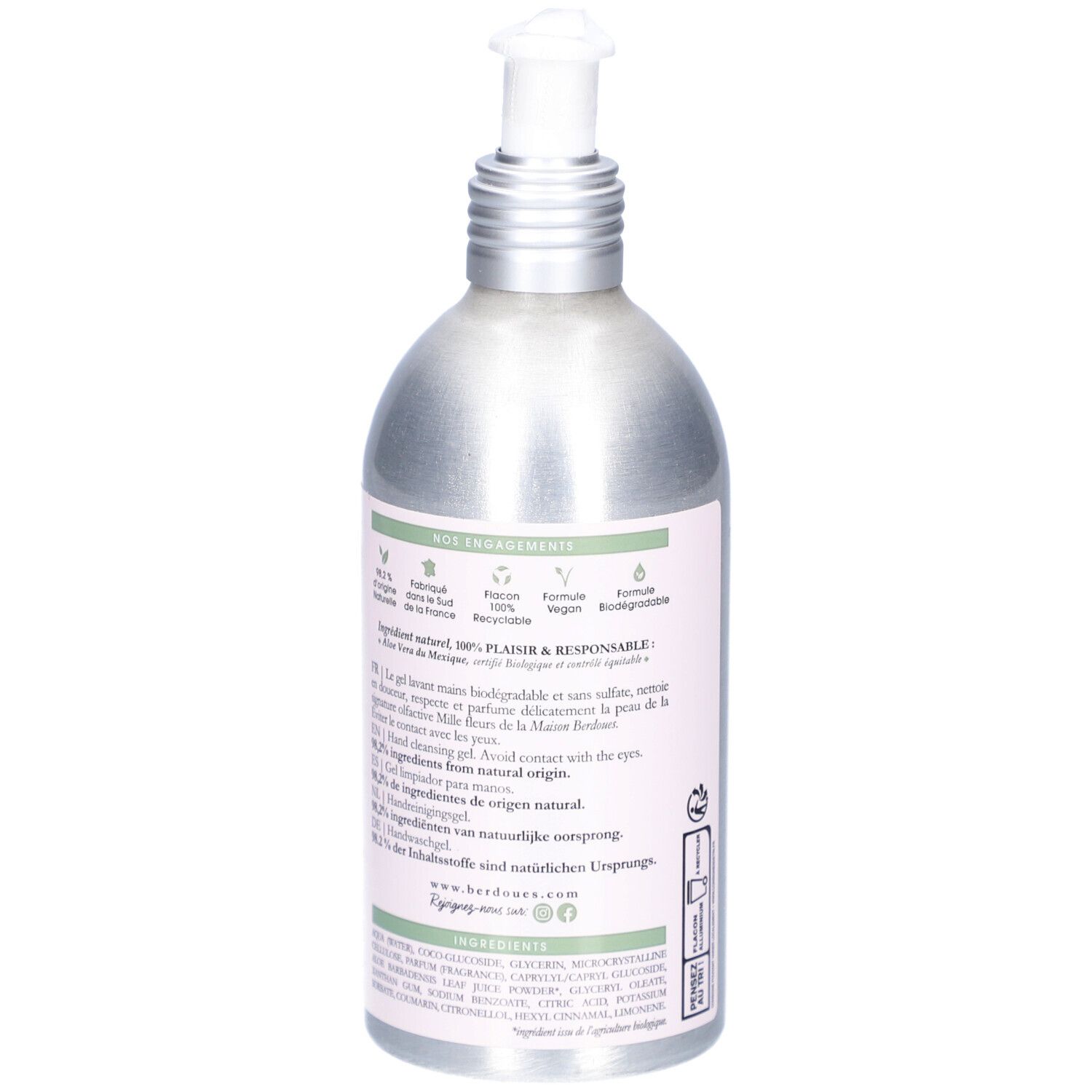 Achterkant van de handwasgel. Tekst in meerdere talen. Logo's voor veganistisch, biologisch afbreekbaar en verantwoordelijk.