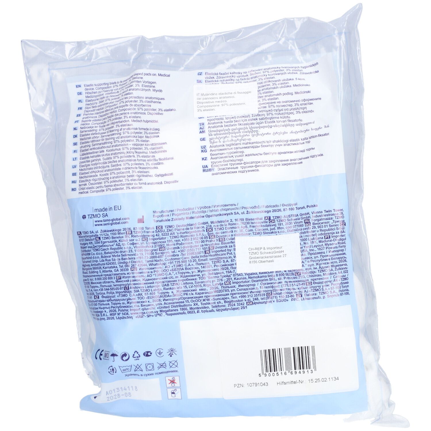 Achterkant van de verpakking SENI Fix Comfort maat L. Tekst en symbolen op de verpakking. CE-markering.