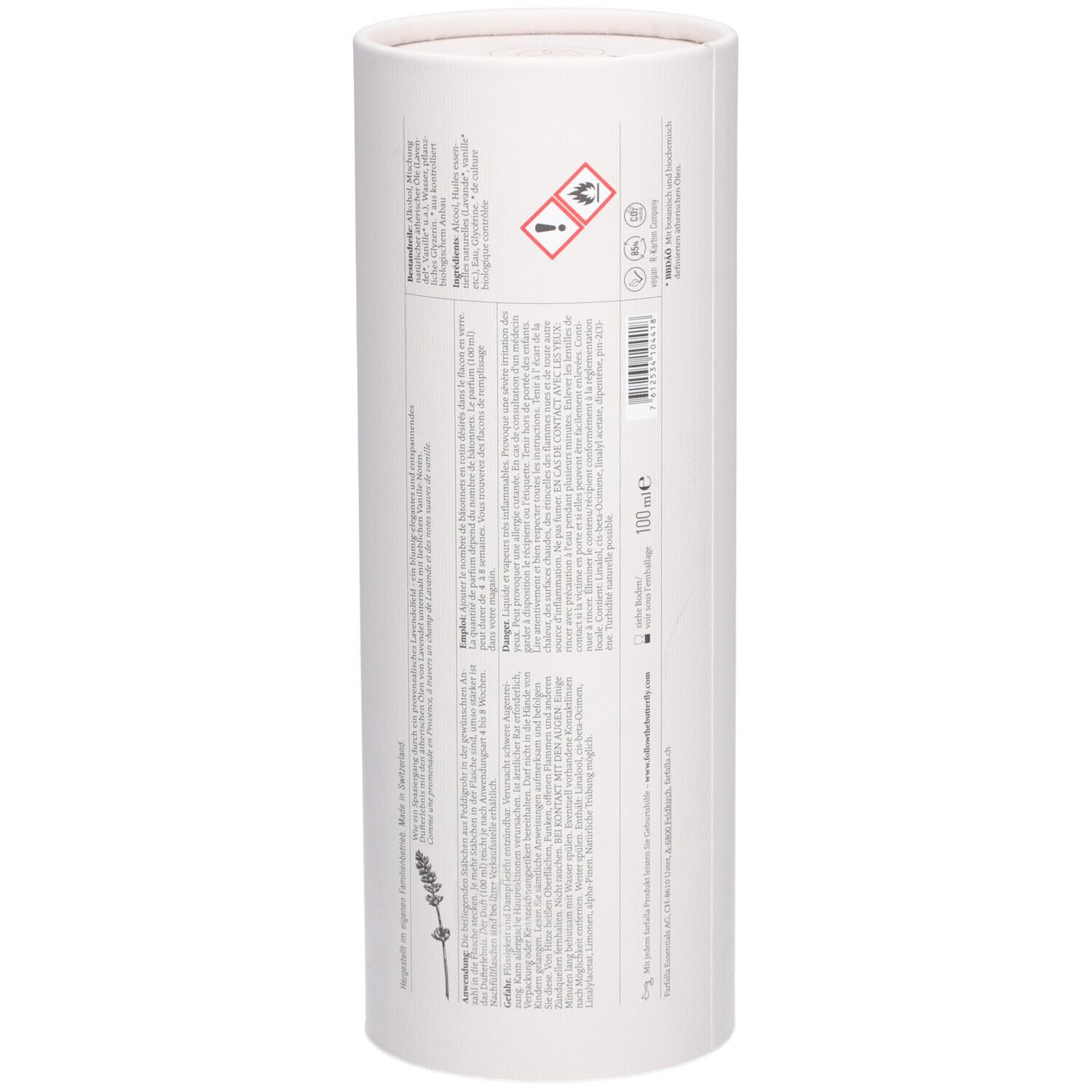 Dos de l'emballage cylindrique. Texte en plusieurs langues. Symboles de danger et informations de fabrication.