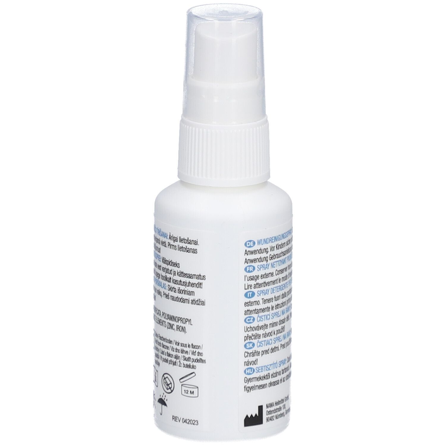 Witte spuitfles met tekst. Bevat informatie over gebruik. Spuitkop.