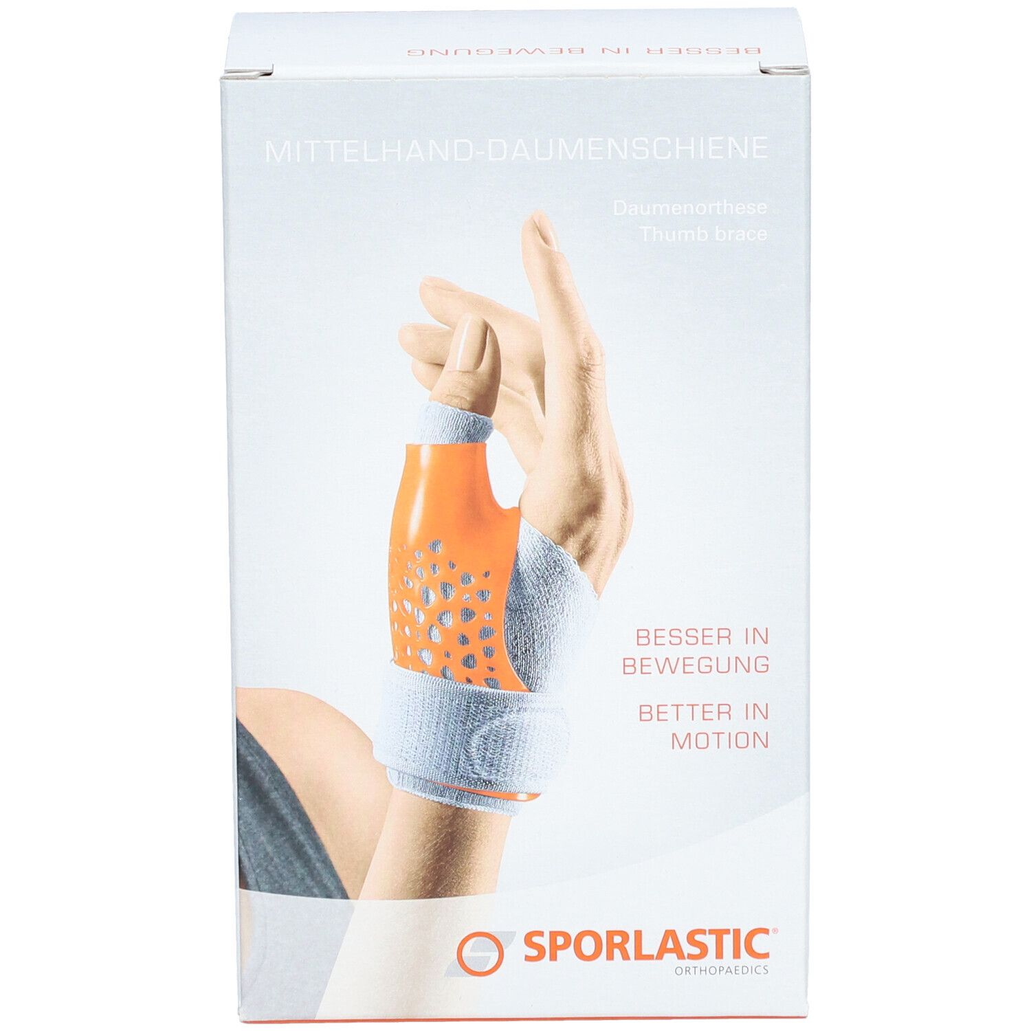 Boîte de l'attelle de pouce. Attelle orange sur une main. Marque SPORLASTIC.