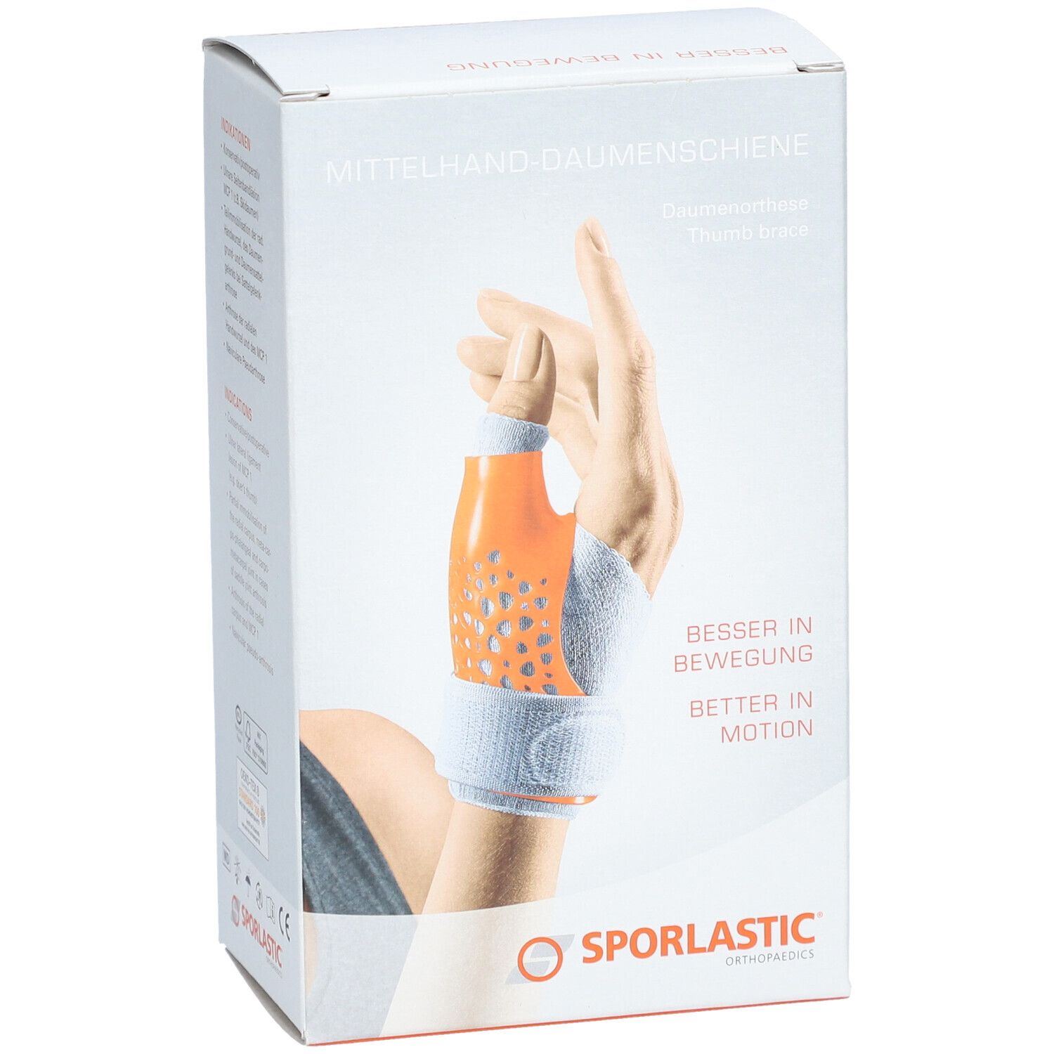 Boîte de l'attelle de pouce. Attelle orange sur une main. Marque SPORLASTIC.