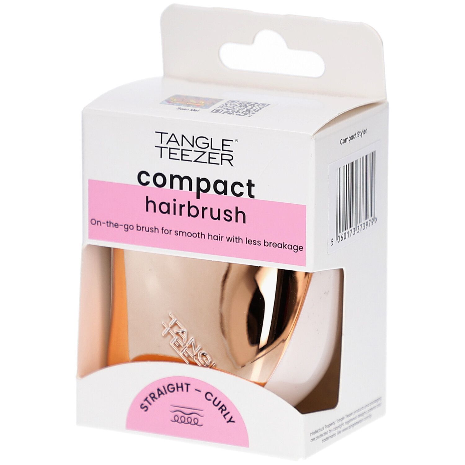 Compacte haarborstel in verpakking. Merk TANGLE TEEZER. Roze en goudkleurig. Voor steil en krullend haar.