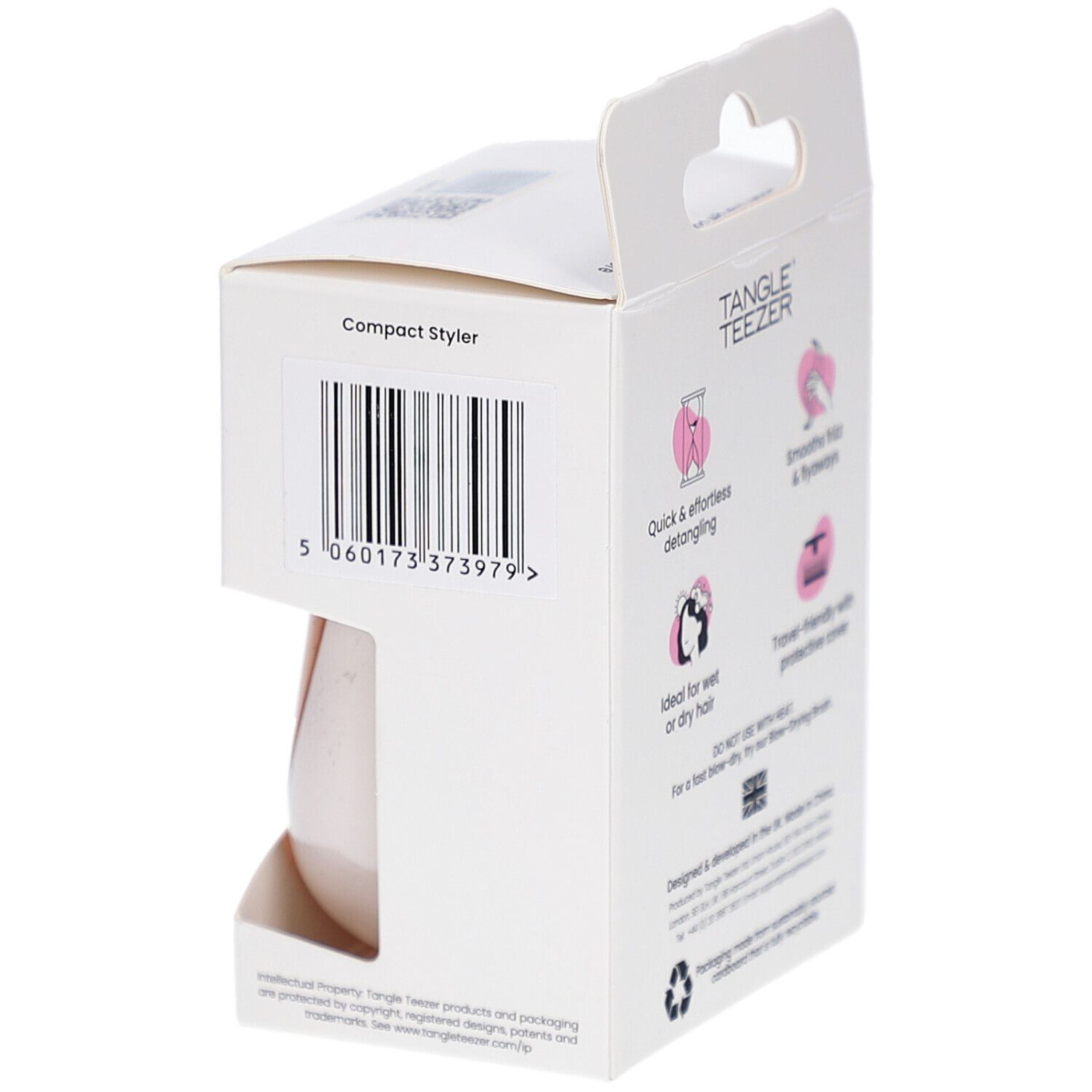 Verpakking van de compacte haarborstel. Merk TANGLE TEEZER. Barcode en productkenmerken op de achterkant.