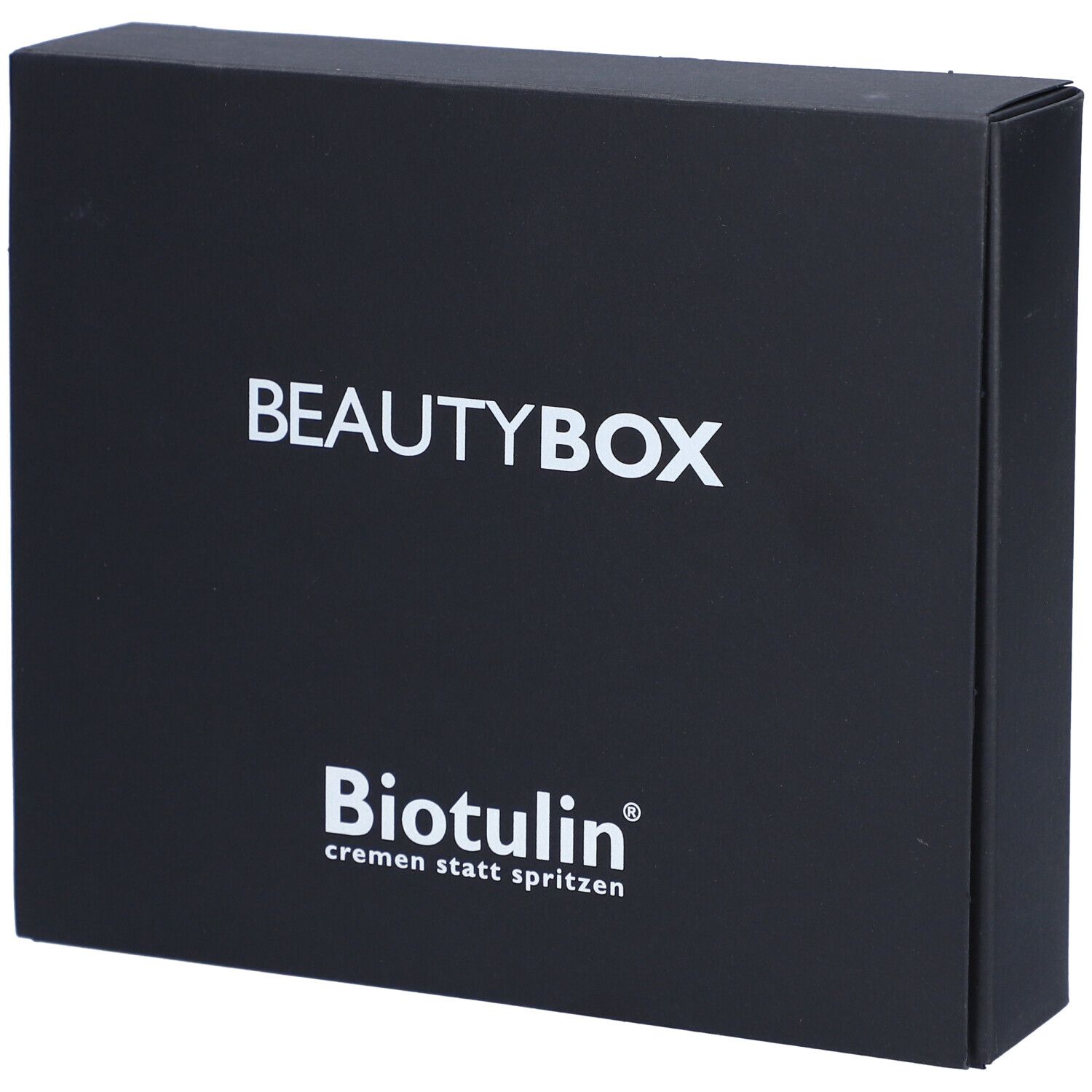 Boîte noire BEAUTYBOX avec logo BIOTULIN et texte blanc. Texte: cremen statt spritzen.