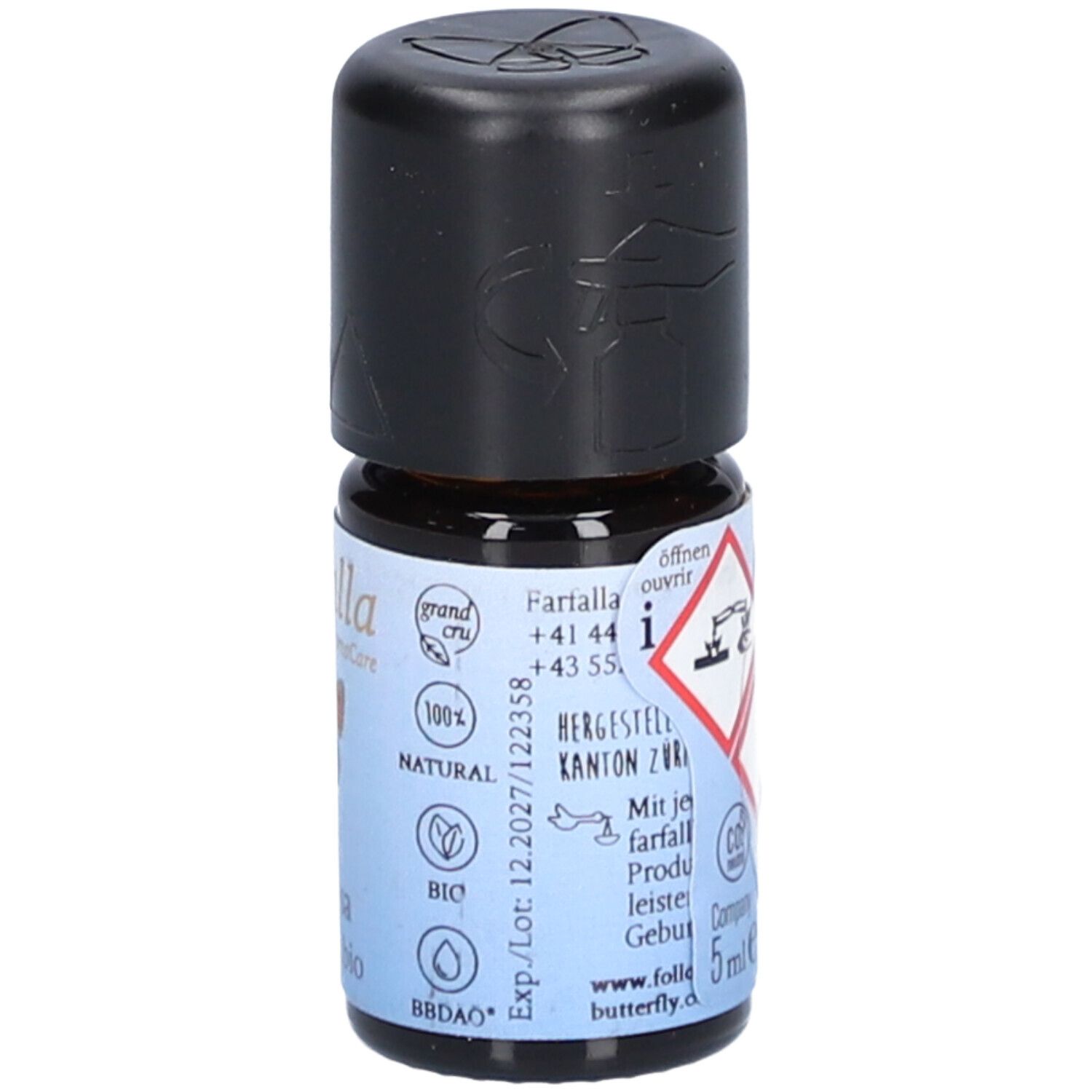 Flacon en verre brun avec bouchon noir. Étiquette: Farfalla AromaCare, 100% Naturel, Bio, 5ml, symboles de danger.