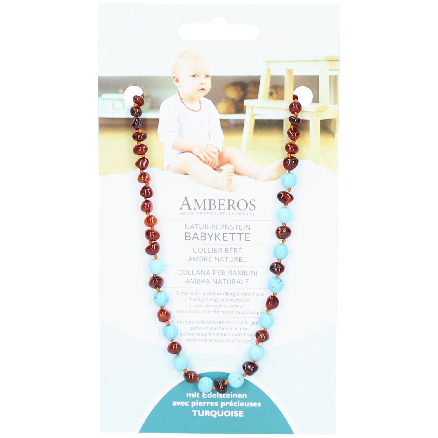 Collier de bébé AMBEROS en ambre et pierres turquoises, sur emballage. Photo d'un bébé. Texte: AMBEROS Natur Bernsteinkette.