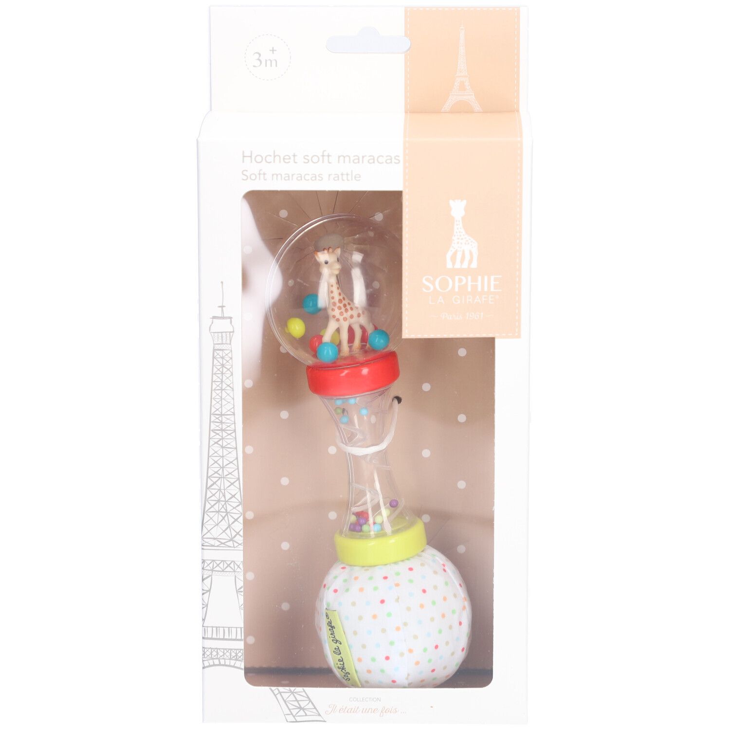 Maracas Rassel dans son emballage. Boîtier transparent avec billes colorées et girafe. Emballage avec nom et logo du produit.