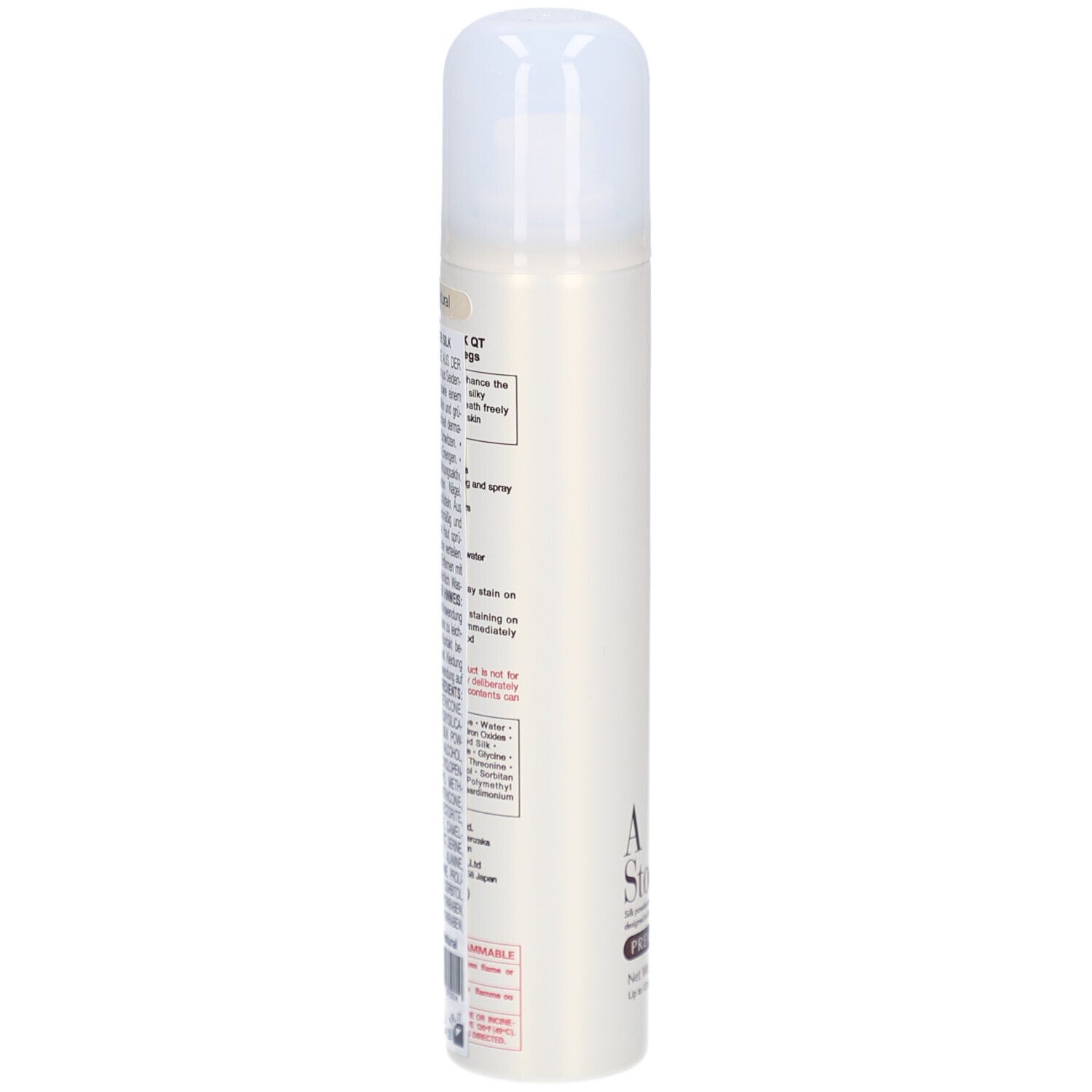Beige spuitbus met witte dop. Tekst: AIR STOCKING PREMIER SILK. Opschrift en informatie.