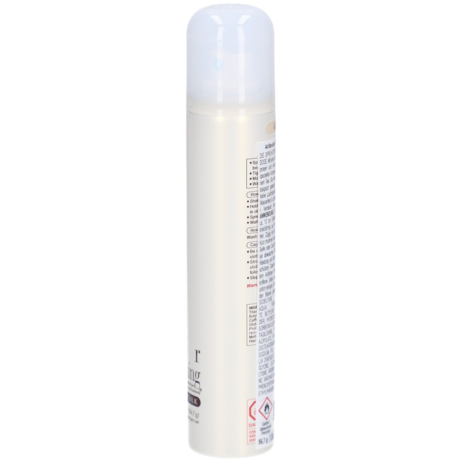 Beige spuitbus met witte dop. Tekst: AIR STOCKING PREMIER SILK. Opschrift en informatie.