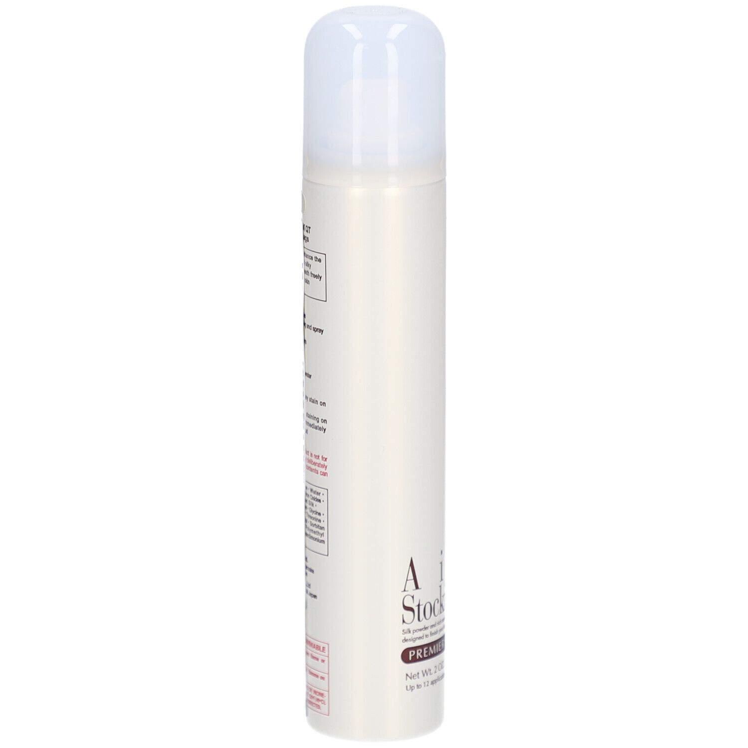 Beige spuitbus met witte dop. Tekst: AIR STOCKING PREMIER SILK. Opschrift en informatie.