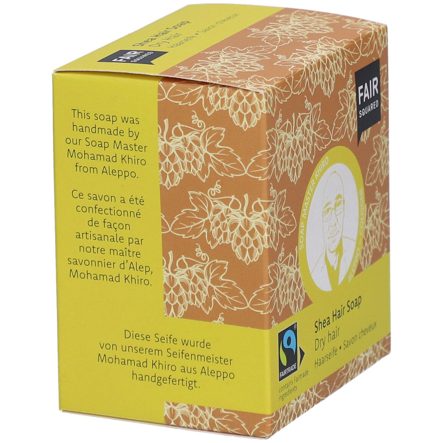 Verpakking FAIR SQUARED. Tekst: handgemaakt door Soap Master Mohamad Khiro uit Aleppo. Met Fairtrade-keurmerk.