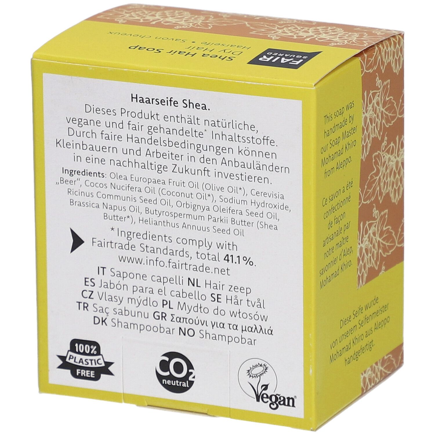 Verpakking met ingrediënten, Fairtrade-normen, Vegan- en CO2-neutraal-keurmerk. Tekst in meerdere talen.