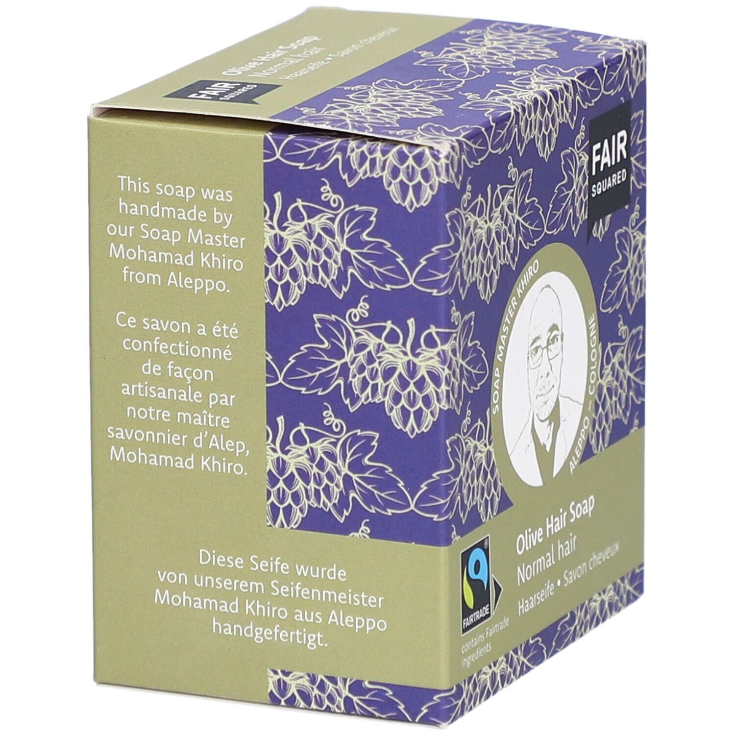 Verpakking FAIR SQUARED Haarseife Olive. Tekst: handgemaakt door Soap Master Khiro uit Aleppo. Fairtrade-label.