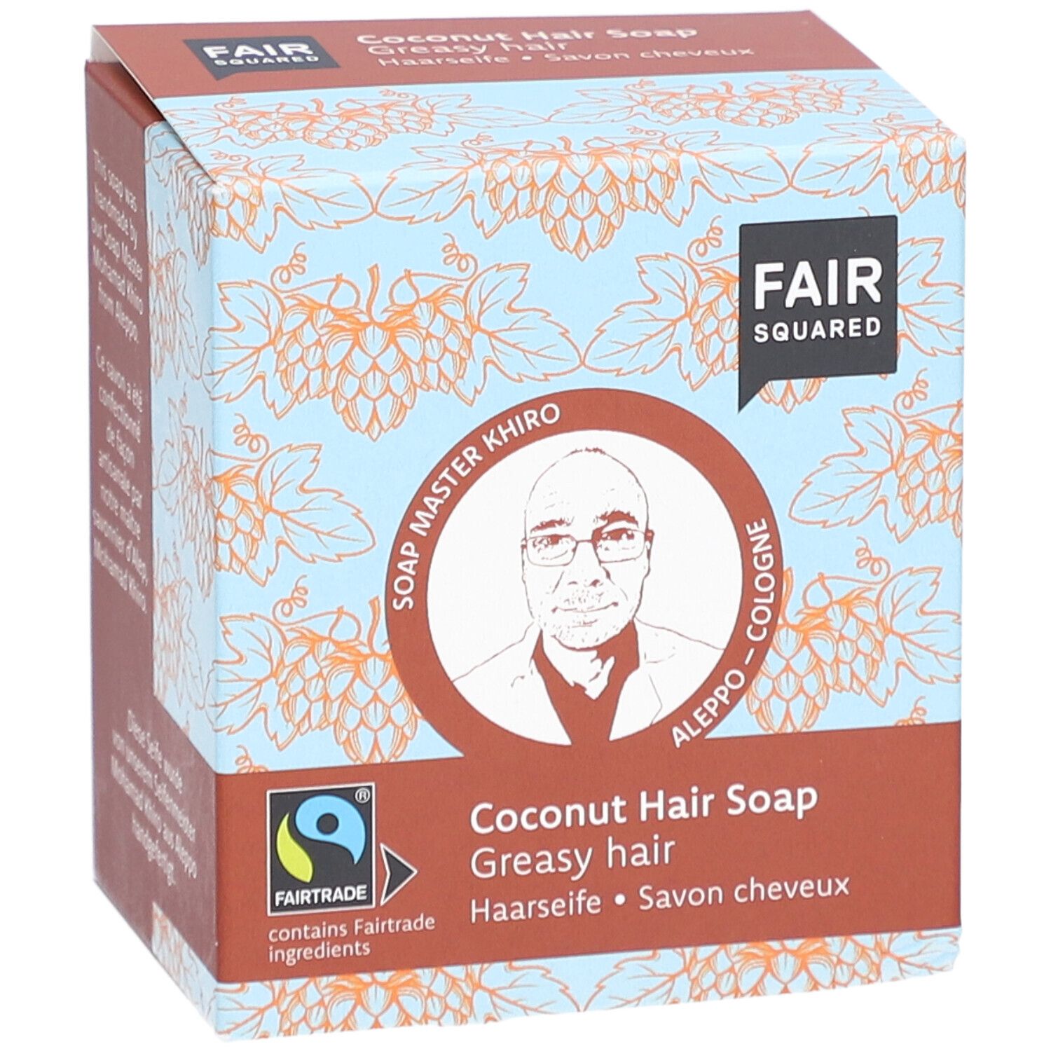 Doosje FAIR SQUARED Haarseife Coco. Opschrift: FAIR SQUARED, Soap Master Khiro, Fairtrade-label, Kokos Haarzeep, voor vet haar.